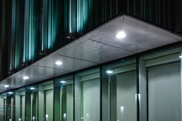 Industrial lighting outside an office block at night